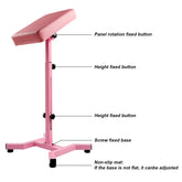 Pink Solong tattoo armrest stand with labels: panel rotation, height adjustment, screw-fixed base, and adjustable non-slip mats.